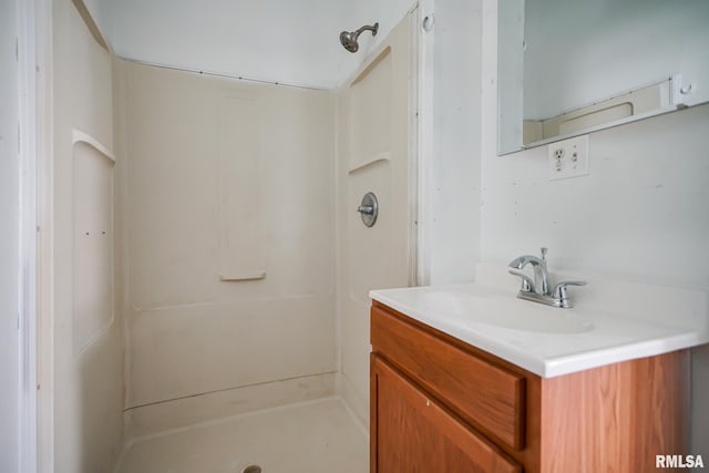 506 Spring St, Peoria, IL 61603 - full bath featuring a stall shower and vanity