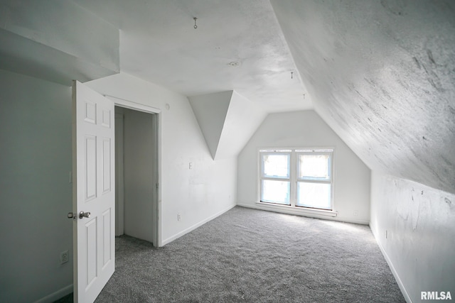 506 Spring St, Peoria, IL 61603 - bonus room featuring carpet flooring and lofted ceiling