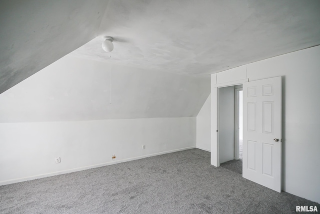 506 Spring St, Peoria, IL 61603 - additional living space featuring carpet flooring and lofted ceiling