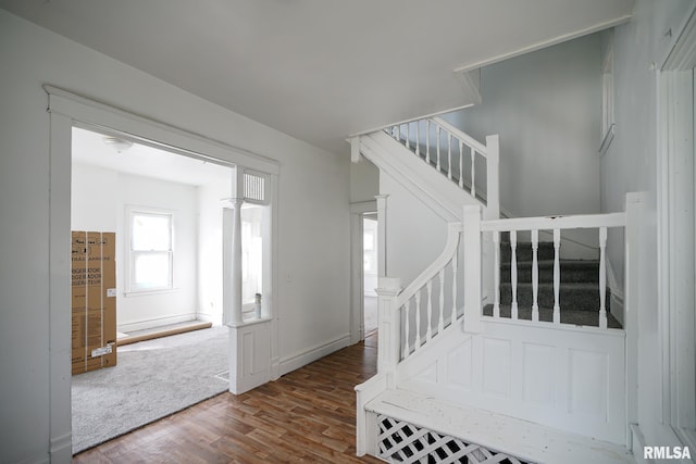 506 Spring St, Peoria, IL 61603 - stairs featuring wood finished floors