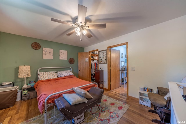 611 E Ash St, Canton, IL 61520 - bedroom with wood finished floors and a ceiling fan
