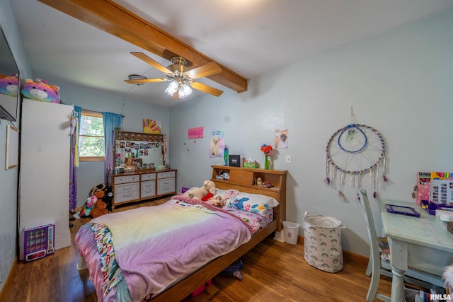 611 E Ash St, Canton, IL 61520 - bedroom featuring beamed ceiling, wood finished floors, and ceiling fan