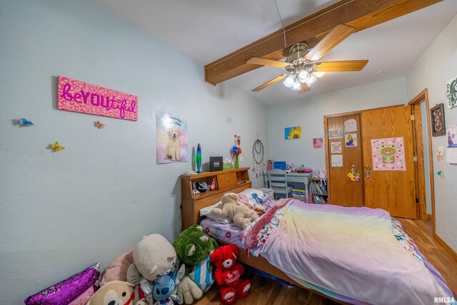 611 E Ash St, Canton, IL 61520 - bedroom featuring wood finished floors, a ceiling fan, and beam ceiling