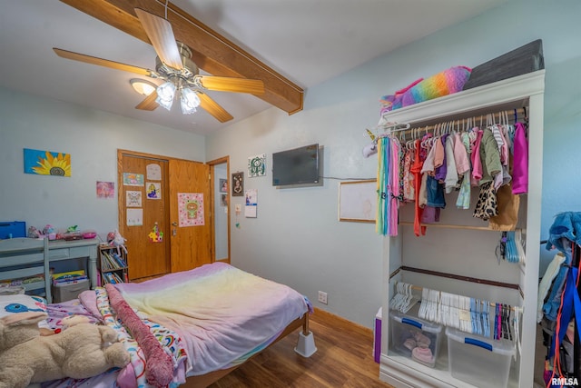 611 E Ash St, Canton, IL 61520 - bedroom with wood finished floors, a ceiling fan, and beam ceiling