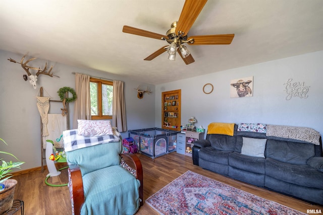 611 E Ash St, Canton, IL 61520 - living area featuring ceiling fan and wood finished floors