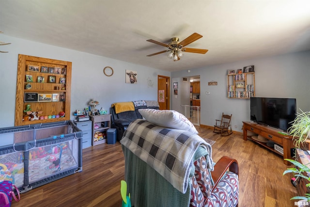 611 E Ash St, Canton, IL 61520 - living room featuring a ceiling fan and wood finished floors