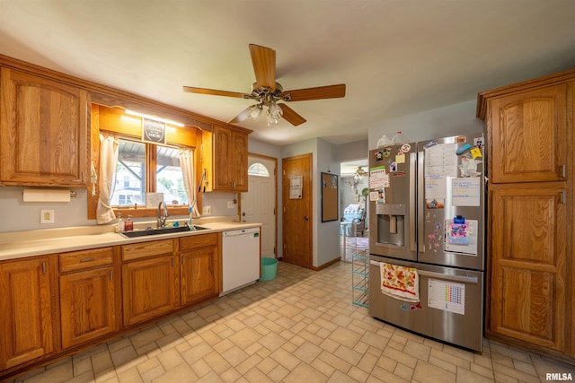 611 E Ash St, Canton, IL 61520 - kitchen with stainless steel fridge with ice dispenser, white dishwasher, and brown cabinets