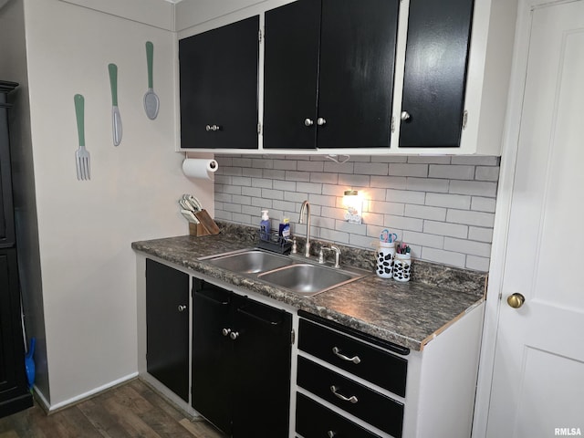 270 Thompson Ct, Canton, IL 61520 - kitchen with dark cabinets, backsplash, dark wood finished floors, and dark countertops