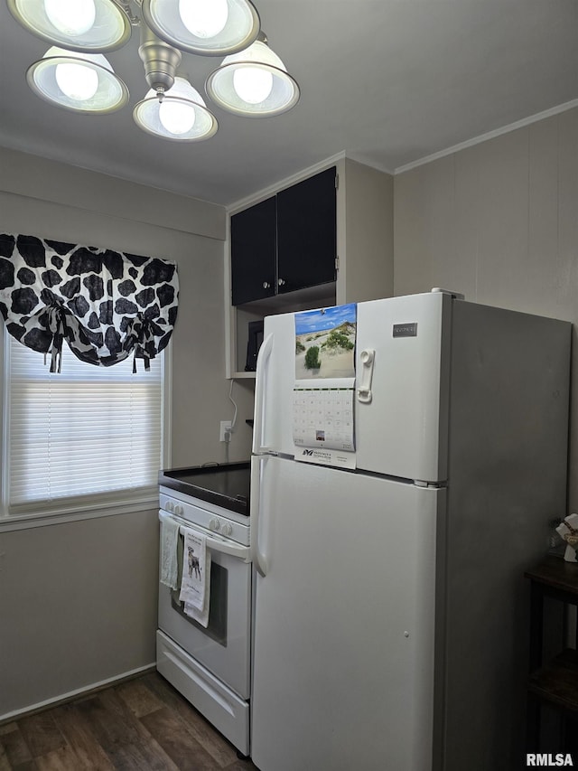 270 Thompson Ct, Canton, IL 61520 - kitchen featuring white appliances, dark wood-type flooring, and dark cabinetry