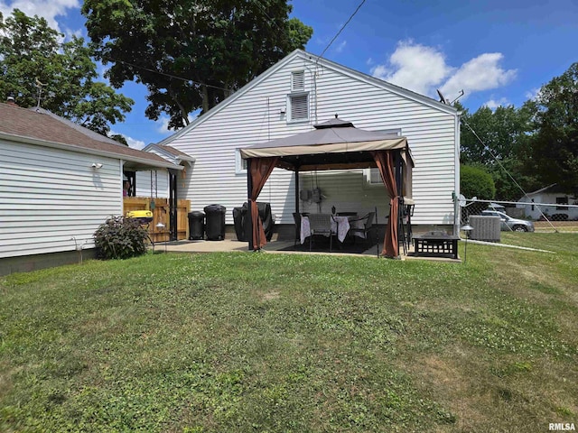270 Thompson Ct, Canton, IL 61520 - rear view of house featuring a gazebo and a patio