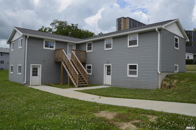 926 N Charles St, Macomb, IL 61455 - back of house with a yard, stairs, and a deck
