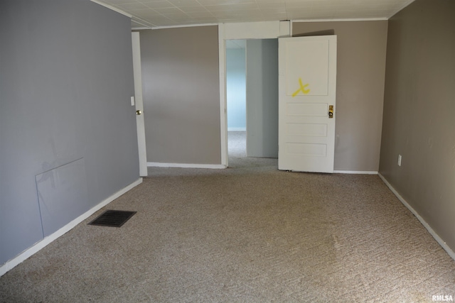 926 N Charles St, Macomb, IL 61455 - carpeted spare room featuring baseboards