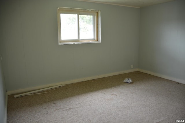 926 N Charles St, Macomb, IL 61455 - carpeted spare room featuring baseboards