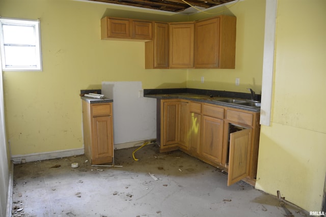 926 N Charles St, Macomb, IL 61455 - kitchen with dark countertops and brown cabinetry
