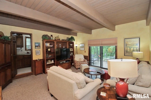 1402 W Grandridge Dr, Dunlap, IL 61525 - living room featuring light carpet and a wooden ceiling with exposed beams