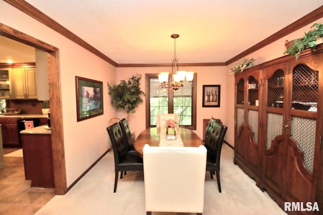 1402 W Grandridge Dr, Dunlap, IL 61525 - dining area with a chandelier, ornamental molding, and light carpet