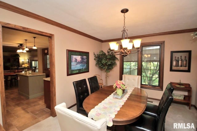 1402 W Grandridge Dr, Dunlap, IL 61525 - dining room featuring a chandelier, crown molding, and ceiling fan