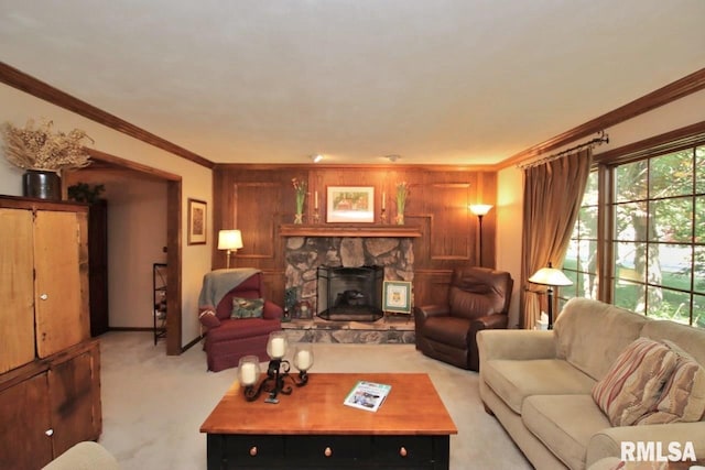 1402 W Grandridge Dr, Dunlap, IL 61525 - living room featuring crown molding, light carpet, a stone fireplace, and wood walls