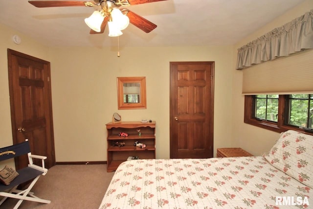 1402 W Grandridge Dr, Dunlap, IL 61525 - carpeted bedroom with a ceiling fan and baseboards