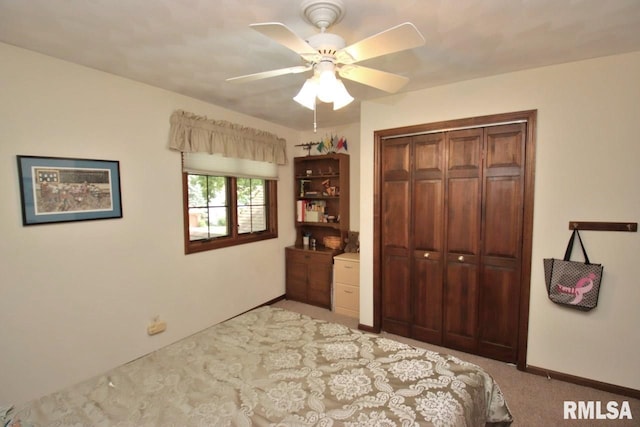 1402 W Grandridge Dr, Dunlap, IL 61525 - bedroom featuring light colored carpet, a closet, and a ceiling fan