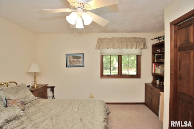 1402 W Grandridge Dr, Dunlap, IL 61525 - bedroom with light colored carpet and ceiling fan