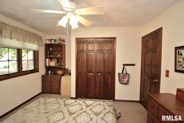 1402 W Grandridge Dr, Dunlap, IL 61525 - bedroom featuring a closet, light colored carpet, and ceiling fan