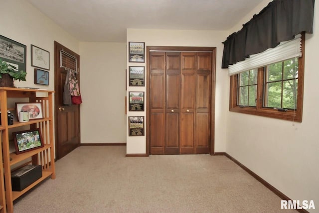 1402 W Grandridge Dr, Dunlap, IL 61525 - bedroom featuring light colored carpet and a closet