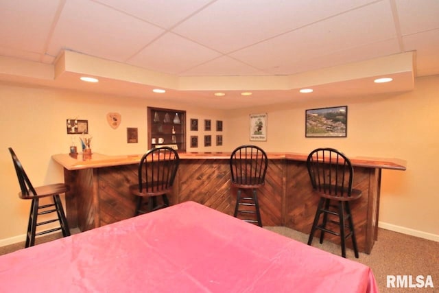 1402 W Grandridge Dr, Dunlap, IL 61525 - carpeted dining space with a dry bar, recessed lighting, and a paneled ceiling