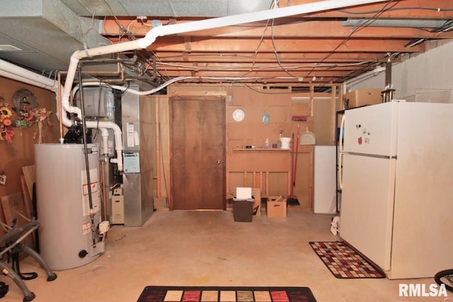 1402 W Grandridge Dr, Dunlap, IL 61525 - unfinished basement with freestanding refrigerator, gas water heater, and heating unit