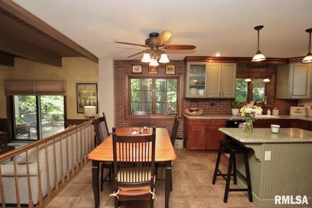 1402 W Grandridge Dr, Dunlap, IL 61525 - dining room with healthy amount of natural light and a ceiling fan