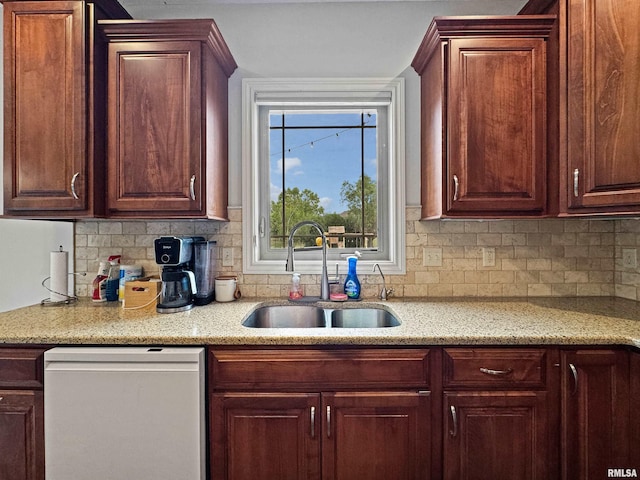 11030 N Ruby Ct, Dunlap, IL 61525 - kitchen with dishwashing machine, tasteful backsplash, and light stone countertops