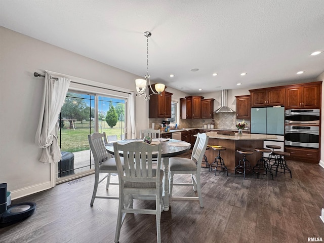 11030 N Ruby Ct, Dunlap, IL 61525 - dining area featuring dark wood finished floors, recessed lighting, and a chandelier