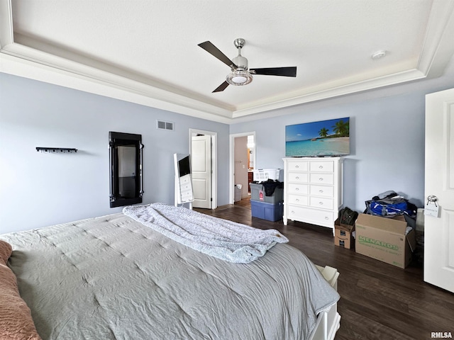 11030 N Ruby Ct, Dunlap, IL 61525 - bedroom with a raised ceiling, wood finished floors, and a ceiling fan