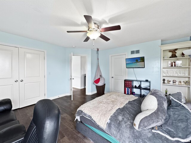 11030 N Ruby Ct, Dunlap, IL 61525 - bedroom featuring wood finished floors, a textured ceiling, a ceiling fan, and an office area
