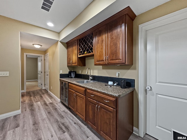 11030 N Ruby Ct, Dunlap, IL 61525 - kitchen with wine cooler, light wood finished floors, and recessed lighting