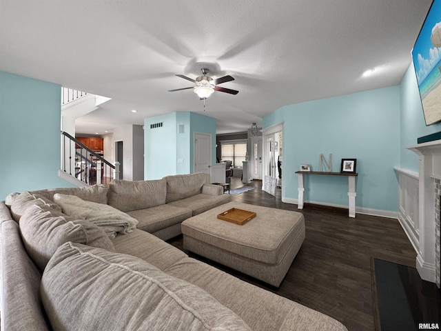 11030 N Ruby Ct, Dunlap, IL 61525 - living area featuring stairway, ceiling fan, a fireplace, wood finished floors, and recessed lighting