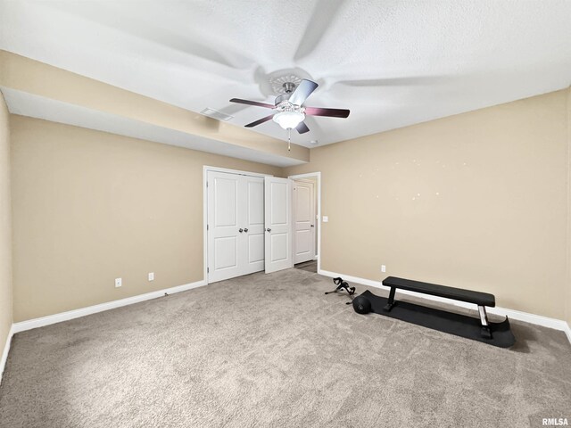 11030 N Ruby Ct, Dunlap, IL 61525 - exercise room featuring ceiling fan and carpet floors