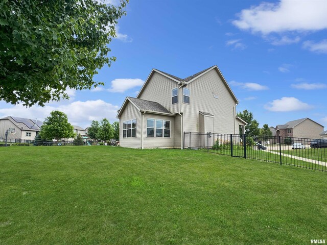 11030 N Ruby Ct, Dunlap, IL 61525 - rear view of property with a fenced backyard and a patio area