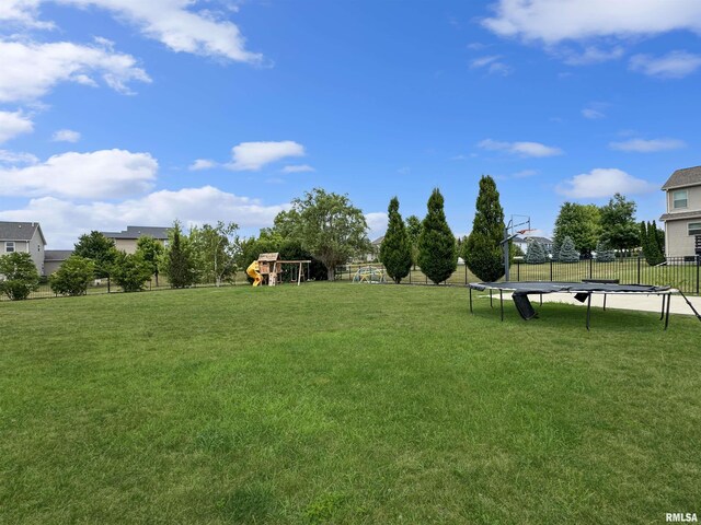 11030 N Ruby Ct, Dunlap, IL 61525 - view of yard with a trampoline, a playground, and a patio