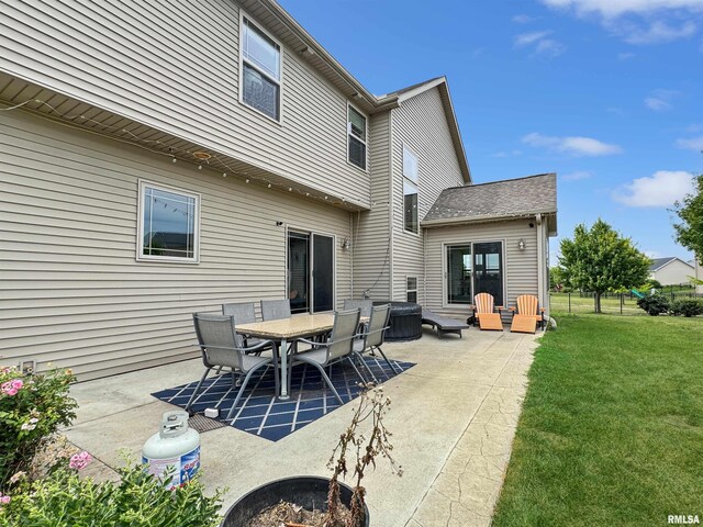 11030 N Ruby Ct, Dunlap, IL 61525 - view of grassy yard featuring a patio area, a playground, and outdoor dining space