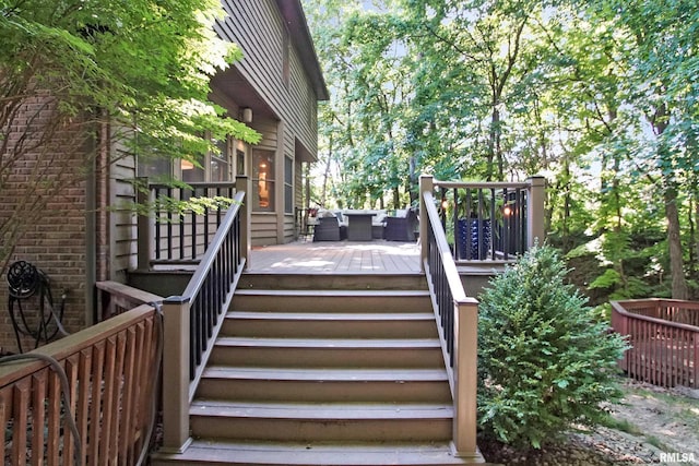 1119 W Brookforest Dr, Peoria, IL 61615 - wooden terrace featuring stairway and an outdoor hangout area