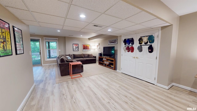 1119 W Brookforest Dr, Peoria, IL 61615 - living area with wood finished floors, a paneled ceiling, and recessed lighting