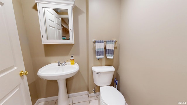 1119 W Brookforest Dr, Peoria, IL 61615 - half bath featuring toilet and tile patterned flooring