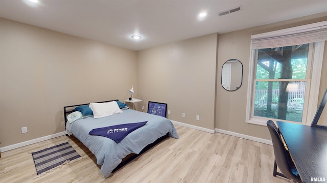 1119 W Brookforest Dr, Peoria, IL 61615 - bedroom with wood finished floors and recessed lighting