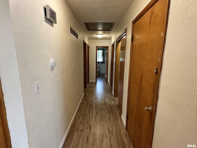 2401 Springfield Rd, East Peoria, IL 61611 - corridor featuring wood finished floors and baseboards