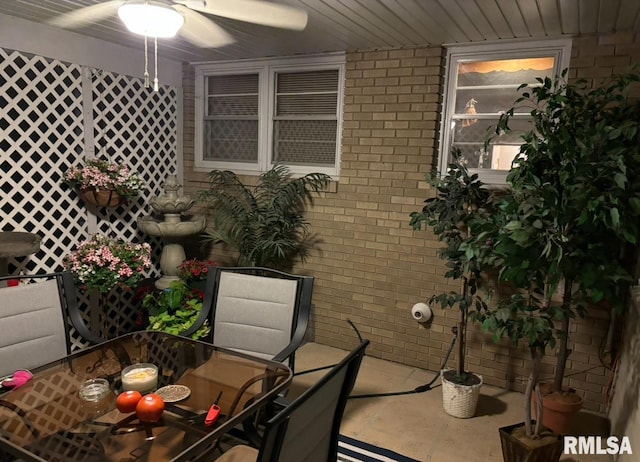 1104 S 8th St, Pekin, IL 61554 - balcony with outdoor dining area and ceiling fan