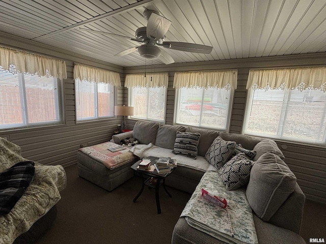 1104 S 8th St, Pekin, IL 61554 - carpeted living room featuring a ceiling fan, wood ceiling, and crown molding