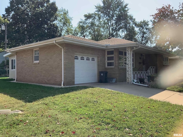 1104 S 8th St, Pekin, IL 61554 - view of home's exterior with a garage, brick siding, and a lawn