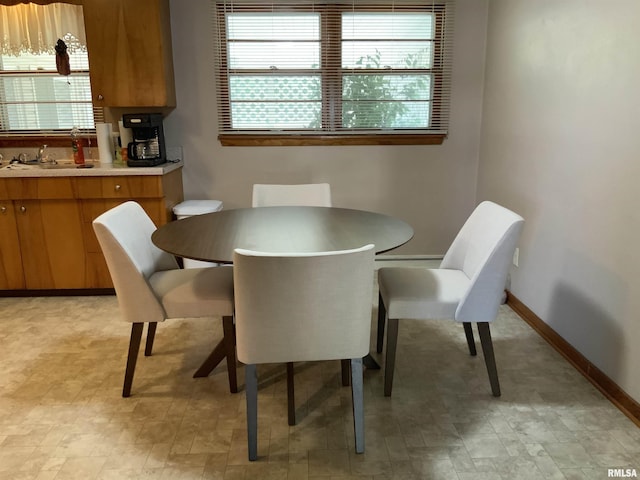 1104 S 8th St, Pekin, IL 61554 - dining area featuring healthy amount of natural light