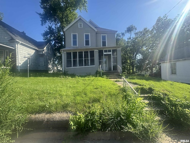 512 Fairholm Ave, Peoria, IL 61603 - back of house featuring a sunroom
